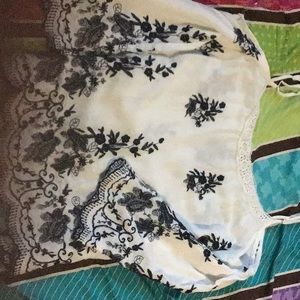 I’m selling a white tank top kind of shirt